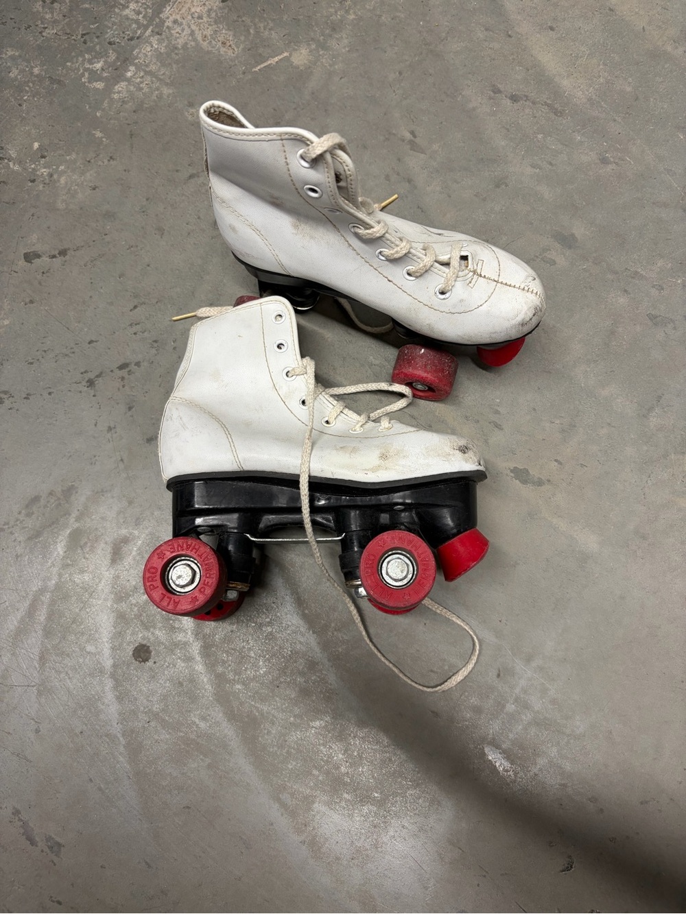 White vintage kids Quad Roller Skates with Red Wheels